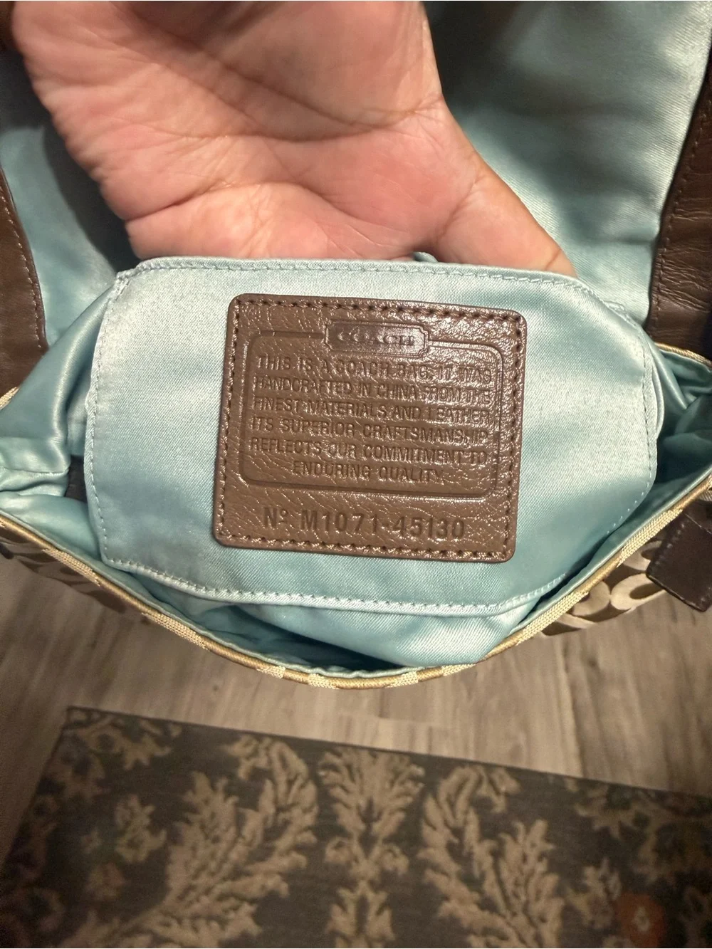 Coach elegant beige